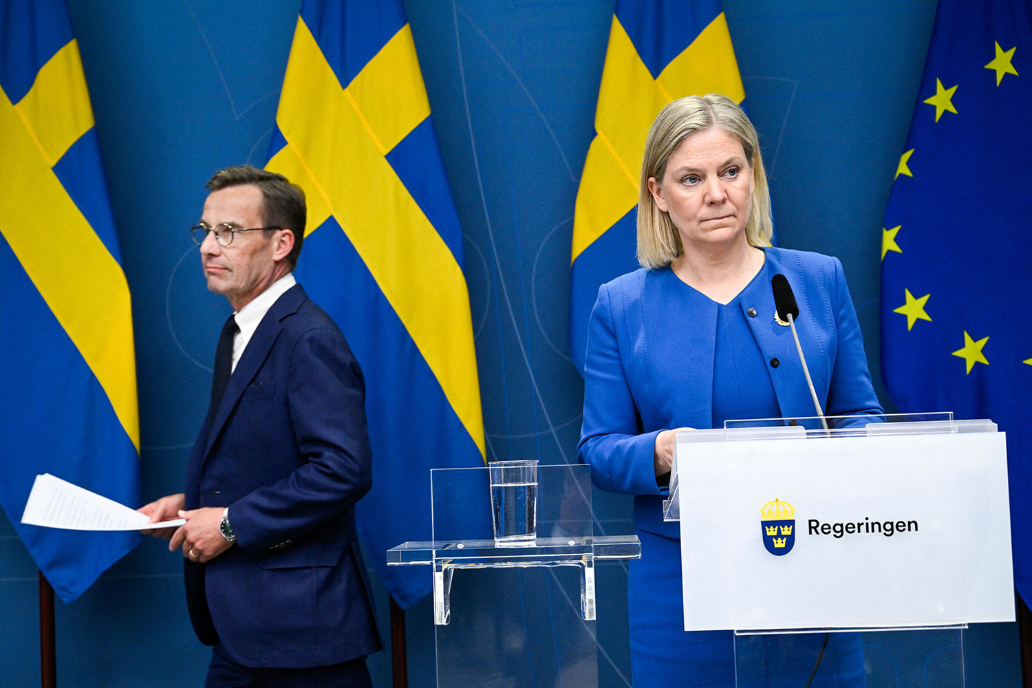 Sweden's Prime Minister Magdalena Andersson (right) and the Moderate Party's leader Ulf Kristersson arrive to address a news conference in Stockholm, Sweden, on May 16, 2022. - Sweden will apply for membership in NATO as a deterrent against Russian aggression, Swedish Prime Minister Magdalena Andersson said in a historic reversal of the country's decades-long military non-alignment. (Henrik Montgomery/TT News Agency/AFP via Getty Images/TNS)